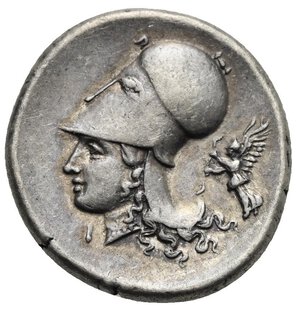 reverse: CORINTHIA. Corinth. Circa  350-300 BC. Stater (Silver, 22.10 mm, 8.55 g). Pegasus flying left, Ϙ below. Rev. Helmeted head of Athena left, wearing Corinthian helmet; I below chin, Nike flying left, holding tainia. Calciati, I, 260, 420. Ravel 1030. BCD Corinth, 111. Light toned with pleasing iridescent gold. Good Extremely Fine.