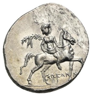 obverse: CALABRIA. Tarentum. Punic occupation, circa 212-209 BC. Half Shekel struck under the magistrate Sokannas (Silver, 20 mm, 3.79 g). ΣΩKAN-NAΣ Armored warrior on horse standing right, holding palm branch in right hand. Rev. TAPAΣ Taras astride dolphin left, holding kantharos in right hand and trident in left; to right, eagle standing left, wings spread. HGC 1, 934. HN III 1082. SNG ANS 1272. Vlasto 984-6. Near Extremely Fine.