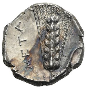 reverse: LUCANIA. Metapontum. Circa 340-330 BC. Nomos (Silver, 21.20mm, 7.60 g). Helmeted head of Leukippos to right; behind, AMI. Rev. META Barley ear with leaf to right; above leaf, thunderbolt. Johnston Class B, 4; HN Italy 1577. Some corrosion, otherwise, Extremely Fine. Rare.