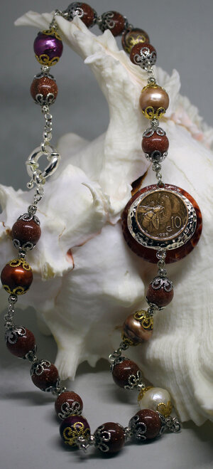 obverse: COLLANA agata di fuoco pelle di serpente, pietra del Sole, perle scaramazze naturali. 10 centesimi Italia
