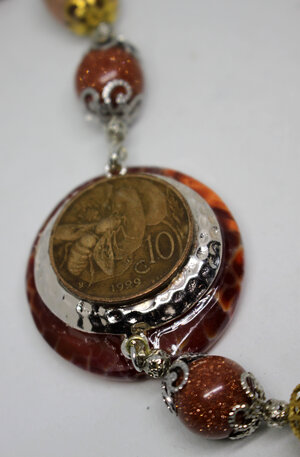 reverse: COLLANA agata di fuoco pelle di serpente, pietra del Sole, perle scaramazze naturali. 10 centesimi Italia
