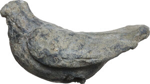 obverse: ROMAN LEAD BIRD FIGURINE  Roman period, c. 1st-3rd century AD.  Roman lead figurine configured as a bird (eagle?) in flight. There are two circular holes in the underlying art, perhaps to allow mounting on a stand.  Dimensions: 42x27 mm.  Weight: 59.60 g