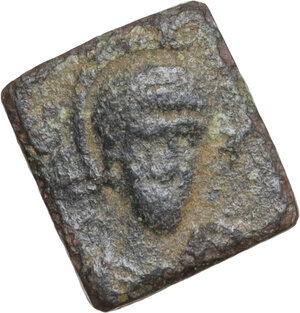obverse: LATE ANTIQUE BRONZE TESSERA  Roman period, 5th century AD.  Game tessera obtained by cutting a bronze coin minted by Arcadius  Dimensions: 11x10 mm.  Weight: 1.11 g