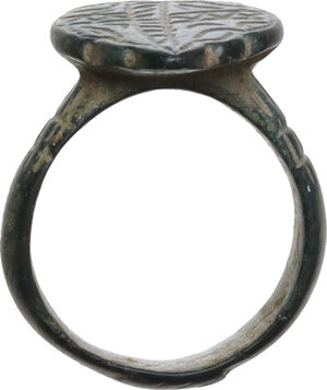 obverse: ANCIENT BRONZE RING  Early Medieval period, c. 7th-12th century AD.  Ancient bronze ring with heart-shaped bezel and engraved cross-shaped decoration with geometric patterns.  Dimensions: 24.5x21 mm.  Inner size: 17 mm