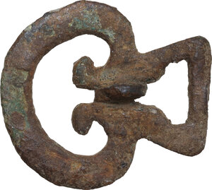 reverse: MEDIEVAL BRONZE BUCKLE  Late Medieval period, c. 14th century AD.  Late medieval asymmetrical buckle with an oval loop and a separate triangular strap loop. The strap bar has a constriction for the pin, flanked by a pair of pointed projections inside the loop.  Dimensions: 31 x 28 mm.  Weight: 8.45 g