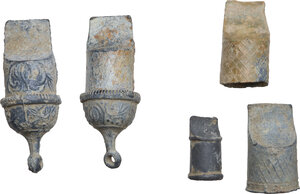 reverse: LEAD WHISTLES  From Roman to Modern times.  Lot of two complete whistles and three lead whistle parts, decorated with phytomorphic and geometric motifs.  Dimensions: from 41 to 17 mm