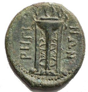 obverse: Bruttium, Rhegion, c. 260-215 BC. Æ Obol (23,1 x 21,2 mm. 7,01 g). Laureate head of Apollo l.; cornucopiae behind. R/ Ornate tripod. HNItaly 2543; SNG ANS 721. Green patina. VF-aEF