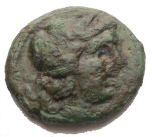 obverse: BRUTTIUM. Rhegion. Circa 215-150 BC. Hexas (Bronze, 14.9 x 13.3 mm, 2.12 g). Laureate head of Apollo to right  Rev. PHΓINΩN The Dioskuroi galloping right, each holding a couched lance. HGC 1, 1721. HN III 2563. Silberstein & Ceccherini VIII, 8. SNG ANS 798-9. Rare and with an green patina. aVF