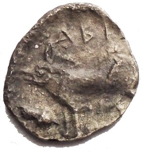 reverse: SICILY. Abacaenum. AR Litra (0.36 gms), ca. 450-400 B.C.  Head of bearded male facing right; Reverse: Boar standing left, acorn at left, above legend. VF