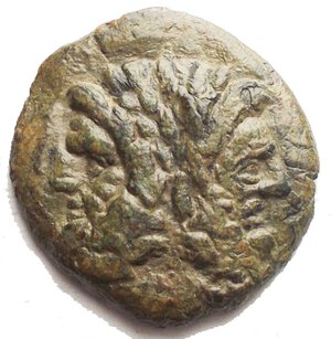 obverse: Sicily, uncertain mint under Roman Rule Æ As. Circa 200-190 BC. Laureate and bearded head of Janus / Monogram of ΠΟR (of quaestor) within wreath CNS I, 67 (Panormos); HGC 2, 1690. 4.92g, 20.95mm Good Very Fine