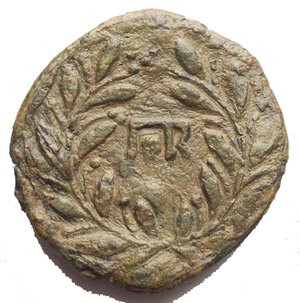 reverse: Sicily, uncertain mint under Roman Rule Æ As. Circa 200-190 BC. Laureate and bearded head of Janus / Monogram of ΠΟR (of quaestor) within wreath CNS I, 67 (Panormos); HGC 2, 1690. 4.92g, 20.95mm Good Very Fine