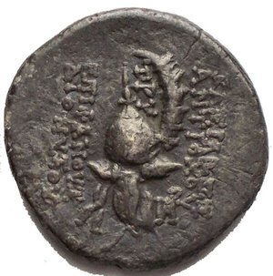 reverse: Seleukid Empire. Antiochos VI Dionysos. AR Drachm. Antioch on the Orontes 144-142 BC. d/Radiate and diademed head right r/ Spiked Macedonian helmet with cheek guards, adorned with wild goat s horn above visor; ΒΑΣΙΛΕΩΣ ΑΝΤΙΟΧΟΥ to right, ΕΠΙΦΑΝΟΥΣ ΔΙΟΝΥΣΟΥ to left, TPY above helmet, monogram below. SC 2003a; HGC 9, 1037. 3.76g, 17.2 x 17.6 mm a EF/ Good VF. Rare. Toned