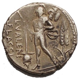 reverse: L. Valerius Flaccus. Silver Denarius (3.9 g), 108-107 BC. Rome. Draped bust of Victory right; below chin, denomination. Reverse: L VALERI / FLACCI in two lines to left, Mars advancing left, holding spear and trophy; in left field, flamen s cap (apex); in right field, grain stalk. Crawford 306/1; Sydenham 565; Valeria 11. Nicely toned. Very Fine. 