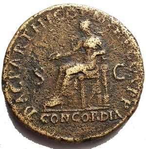 obverse: Hadrian Æ Dupondius. AD 117. IMP CAES DIVI TRAIAN AVG F TRAIAN HADRIAN OPT AVG GER, radiate and cuirassed bust right, slight drapery on far shoulder / DAC PARTHICO P M TR P COS PP, Concordia seated left, holding patera and resting arm on small statuette of Spes standing on small column; cornucopiae below seat; CONCORDIA - S-C in two lines in exergue. RIC II 538b. 12.72g, 26.8 x 26.6mm aVF