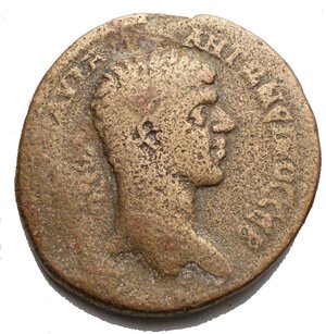 obverse: SYRIA, Seleucis and Pieria. Antioch . Elagabalus. AD 218-222. Æ 8 Assaria ( 31,5 mm, 22.92 g, ). Laureate head right / Tyche seated left on rocky outcropping, holding grain ears; above, ram leaping left;  star ? to upper left, Δ-Є flanking Tyche; at feet, half-length figure of river-god Orontes swimming left. RIF McAlee 802b/1  var