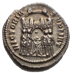 reverse: Diocletianus (284-305). AR Argenteus, 294 AD. Obv. DIOCLETIANVS AVG. Laureate head right. Rev. VICTORIA SARMAT. The four princes sacrificing over tripod before gate in six-turreted enclosure. AR. g 3,53. mm 19,53. RR. EF. Good patina