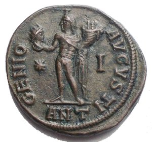 reverse: Licinius I Æ Nummus. Antioch, AD 312. IMP C LIC LICINNIVS P F AVG, laureate head right / GENIO AVGVSTI, Genius standing left, holding head of Sol and cornucopiae; *- I across fields, ANT in exergue. 5.18g, 21.5 x 19.7mm Good Very Fine.