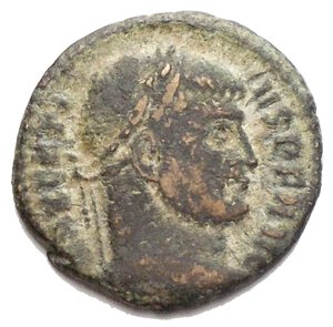 reverse: Maxentius (307-312). Æ Quarter Follis (16,55 mm. 1,85 g). Rome 310-2. Laureate head r. R/ VOT/QQ/MVL/X within wreath. RIC VI 281a.  near VF