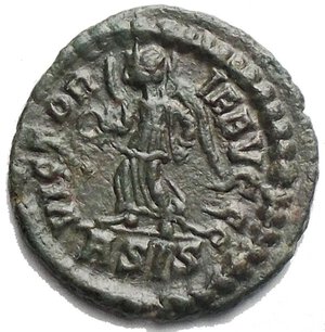 reverse: Valentinian II AD 375-392. Siscia Follis Æ 14,7 x 14,9 mm. 1,25 g D N VALENTINIANVS P F AVG, draped, cuirassed and pearl-diademed bust right / VICTOR IA AVGGG / ASIS, Victory walking left, holding wreath and palm-branch. aEF. Green patina     Valentinian II, ascending to the throne of the Roman Empire in AD 375, was a pivotal figure during a tumultuous period in Roman history. Born in AD 371, he inherited the mantle of emperor upon the death of his father, Valentinian I, at a tender age. As a result, his rule was initially guided by regents and influential advisors. During Valentinian II s reign, the Roman Empire was deeply divided. He ruled over the western provinces, while his brother Valens governed the eastern territories. This division underscored the immense challenges of managing an empire stretched to its geographical and administrative limits. A defining aspect of Valentinian II s reign was the religious conflict between Nicene Christianity and Arianism. Although raised in the Nicene Christian faith, his mother held sympathies for Arianism, leading to religious tensions that reverberated throughout his rule. Powerful advisors and generals, notably figures like Arbogast, exerted substantial influence over Valentinian II s decisions and policies. Their sway over imperial affairs showcased the complexities of governance during this period. Tragically, Valentinian II s life ended abruptly and under mysterious circumstances in AD 392, possibly by his own hand. His death marked the conclusion of the Valentinian Dynasty, as the western and eastern halves of the Roman Empire continued to chart their separate courses.