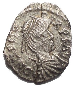 obverse: Germanic Migration Period. Odovacar AR Half Siliqua. AD 476-493. Struck in the name of Zeno. D N ZENO PERP F AV, pearl-diademed, draped and cuirassed bust right / Eagle standing left on branch, head to right, cross to left. RIC 3648; Ranieri 230. 0.76g Good Very Fine. Very Rare.