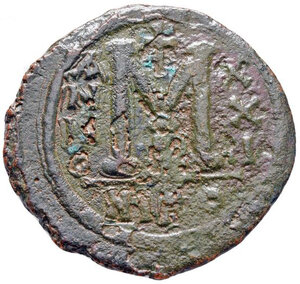 reverse: 
GIUSTINIANO I (527 - 565). Nicomedia. AE Follis - 40 Nummi (13,93 gr. - 36 mm.). D.\: D N IVSTINIANVS P P AVG. R.\: M - A/N/N/O XXI - NIKO. Sear 201. qBB.
 