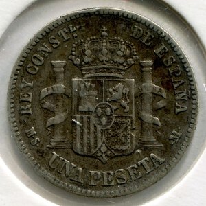 reverse: Spagna. Re Alfonso 12°. 1 peseta del 1883. Ag 0.853‰.  qBB. NC.