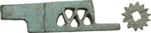 obverse: ROMAN PADLOCK AND CASKET DECORATION  Roman period, c. 1st-3rd century AD.  Lot of two Roman bronze objects, comprising a padlock and a star shaped casket decoration.  Dimensions:   Padlock, 57 x 15 mm.  Decoration, diameter 14.5 mm
