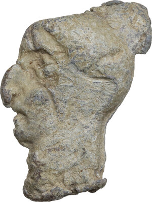 reverse: ROMAN LEAD HEAD  Roman period, c. 2nd-4th century AD.  Lead plaque in the shape of a female head (?) with both faces in relief. The grotesque features suggest a deliberately ugly caricature The characteristics are rendered with a beak nose, big eyes on a narrow face with a long neck.  Dimensions: 41 x 25 mm.  Hollow and a cracked area (see the pictures above), otherwise very well preserved