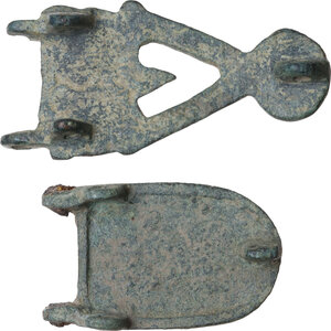 reverse: TWO BYZANTINE FIBULAE  Late Roman period, c. 7th century AD.  Lot of two Byzantine bronze fibulae with engraved decoration.  Dimensions: 51x24 and 37x23 mm