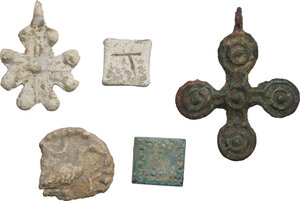 obverse: FIVE ANCIENT ITEMS  Roman to Byzantine period, c. 1st to 12th century AD.  Lot of five ancient items, including two byzantine crosses, one in lead and the other in bronze, two inscribed weights, one in lead and the other in bronze, and a leaden tessera.  Dimensions: from 36 to 11.5 mm