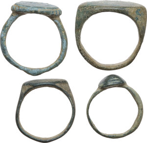 obverse: FOUR ANCIENT RINGS  Greek World to Early Medieval period, c. 3rd century BC to 10th century AD.  Lot of four (4) ancient bronze rings.  Various inner sizes