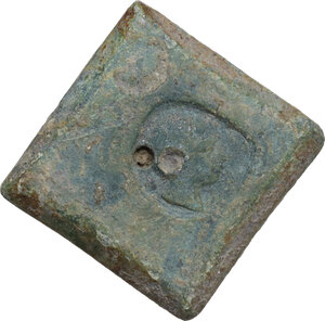 obverse: HELLENISTIC BRONZE WEIGHT  Greek Sicily (?), c. 4th-2nd century BC.  Square-shaped bronze weight with rhomboidal incuse bottom and countermark with a male head right on the flat part.  Dimensions: 24 x 24 mm.  Weight: 16.64 g