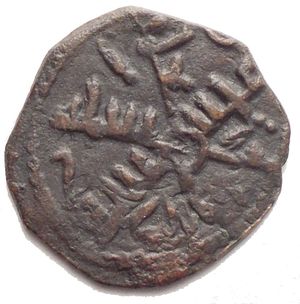 reverse: - Messina Ruggero II (1105-1154) 1/2 Follaro. D/ Croce, al centro stella; negli spazi leggenda cufica. R/ Leggenda cufica disposta attorno a globetto. Sp.79. AE, 1.37 gr. BB+