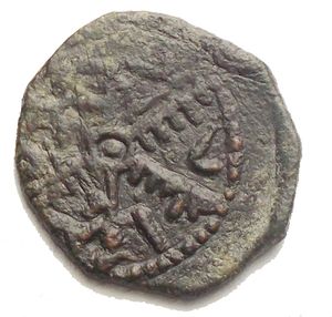 reverse: Messina Ruggero II (1105-1154) 1/2 Follaro. D/ Croce, al centro stella; negli spazi leggenda cufica. R/ Leggenda cufica disposta attorno a globetto. Sp.79. AE, 1.37gr. BB+ 