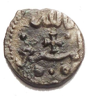 obverse: Palermo o Messina. Guglielmo II (1166-1189). Frazione di dirhem. Sp. 116. AE. g 0,73. mm 10,26 R. qSPL.