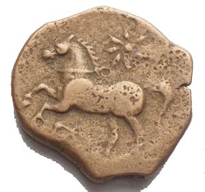 obverse: Apulia. Arpi (Circa 325-275 a.C.) AE 16.3 x 14.4 mm. D/ Testa di Zeus a sinistra. R/ Cavallo al galoppo a sinistra, sopra stella. 3.04 gr. HN Italy 644. BB