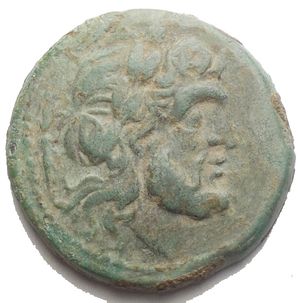 obverse: Bruttium, the Brettii Æ Unit (Drachm). Circa 211-208 BC. Laureate head of Zeus to right; thunderbolt behind / Warrior advancing to right, nude but for helmet, holding shield and spear, leaf to lower right. 7.45 g, 22mm. Good VF. Gorgeous green patina