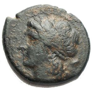 obverse: CAMPANIA, Cales. Circa 265-240 BC. Æ (21.9mm, 6.51 g). Laureate head of Apollo left; kantharos behind / Man-headed bull standing right, head facing; lyre above, Γ below. HN Italy 436; SNG ANS –. Dark green patina. aVF
