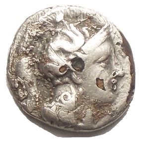 obverse: Southern Lucania, Thurium. AR Diobol, c. 350-300 BC. Head of Athena right. / ΘΟΥΡΙΩΝ/ΗΡΑ. Bull charging right; fish in exergue. HN Italy 1866; SNG ANS 1169. AR. 0.8 g. 11.4 x 10.7 mm. VF.