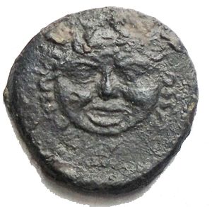 obverse: SICILY. KAMARINA. AE Onkia ø 14.2 mm, 1.14 g, approx. 420 - 410 BC. BC Vs.: Head of the Gorgon with open mouth, frontal. Rev.: Owl r. standing, holding a lizard in its claws, including a ball of value. Westermark, Kamarina Tf. 33,188.1; CNS III p. 52, no. 13/3; HGC 2, 552. Black green patina. VF