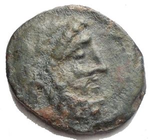 obverse: Sicily, Panormos Æ 19,38 mm. Circa 208-180 BC. Laureate head of Zeus to right / Warrior standing to left. 4.97 g Good Very Fine. Rare.