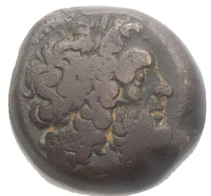 obverse: PTOLEMAIC KINGS of EGYPT. Ptolemy II Philadelphos. 285-246 BC. Æ Diobol (27.7 mm, 15.7 g). Alexandreia mint. Laureate head of Zeus-Ammon right / Eagle, wings spread, standing right on thunderbolt; to left, monogram above shield; Δ between legs. Rif Svoronos 564 Good F. Countermark