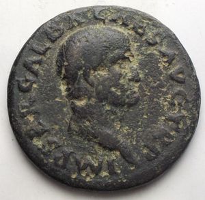 obverse: Galba (68-69), As, c. end of September or early October AD 68; AE (g 10,14; mm 26,47); IMP SER GALBA CAES AVG TR P, bare head r., Rv. VES - TA, Vesta, draped, seated l. on low chair, holding Palladium and sceptre; in field, S - C. RIC 374; C 311. Dark greene patina. Very fine.