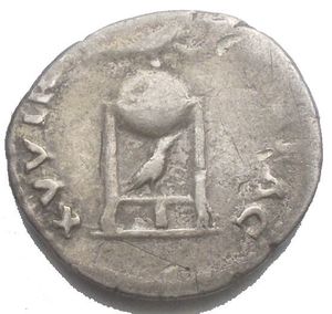 reverse: Vitellius (late April-20 December AD 69). AR denarius (19.1 x 17.7mm, 3,3 g). d/ A VITELLIVS GERMAN IMP TR P, laureate head of Vitellius right r/ XV VIR-SACR FAC, tripod-lebes surmounted by dolphin right, raven standing right below. RIC I 86. VF. Toned