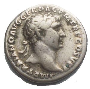 obverse: Trajan. AD 98-117. AR Denarius (18.2mm, 3.28 g). Rome mint. Struck circa AD 103-107. IMP TRAIANO AVG GER DAC P M TR P COS V P P, laureate bust right, slight drapery on shoulder / S P Q R OPTIMO PRINCIPI, mourning Dacian seated right on shield, leaning on right arm and resting head in left hand; curved sword below. RIC II 218; Woytek 189bA; BMCRE 179; RSC 529a. 