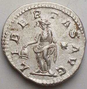 reverse: Roman Imperial Elagabalus, 218-222. Denarius (Silver, 18.7 x 19.3 mm, 3.04 g), Rome, 220-222. IMP ANTONINVS PIVS AVG Laureate and draped bust of Elagabalus to right, seen from behind. Rev. LIBERTAS AVG Libertas standing front, head to left, holding pileus in her right hand and scepter in her left; in field to right, star. BMC 220. Cohen 92. RIC 107. Nearly extremely fine.