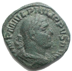 obverse: Philip I, 244-249. Sestertius (29,4 mm. 17,11 g) Rome 248. d/ IMP M IVL PHILIPPVS AVG Laureate, draped and cuirassed bust of Philip I to right. r/ P M TR P V COS III P P / S - C Mars standing front, head to left, holding olive branch in his right hand and placing his left on shield set on the ground; spear leaning against his left shoulder. VF. Green patina