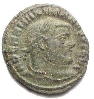 obverse: Maximianus Herculius AD 286-305. Siscia Follis Æ 18,67 x 19,77 mm. 2,2 g. d/IMP C MA MAXIMIANVS PF AVG, laureate head right r/ GENIO POPV-L[I] ROMANI, Genius standing left, modius on head, naked except for chlamys over left shoulder, holding patera in right and cornucopiae in left hand; mintmark SIS. Very Fine - nearly extremely fine. Green patina RIC.146 var.