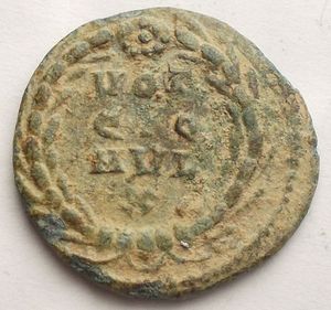 obverse: Maxentius (307-312). Æ Quarter Follis (15.84 mm, 1.84g). Rome, 310-2. Laureate head r. R/ VOT/QQ/MVL/X within wreath. RIC VI 281a. Good patina. Good VF