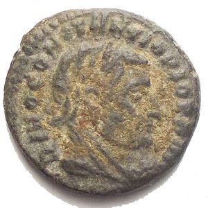 obverse: Divus Constantius I Æ Nummus. Rome, AD 317-318. DIVO CONSTANTIO PIO PRINC, laureate, veiled and draped head right / MEMORIAE AETERNAE, eagle standing right, head and tail left, with wings displayed; RP in exergue. 2.3g, 15.8mm aEF Very Fine.